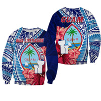 Blue Guam Liberation Day sweatshirt, floral graphic and “GUAM” emblem