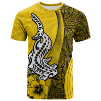Yellow T-shirt with large shark graphic, hibiscus flowers, and tribal pattern