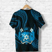 Rear view Tonga pattern T-shirt on hanger, dark navy with bright blue crest centerpiece