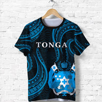 Tonga pattern T-shirt on hanger, dark navy and bright blue front crest with crosses
