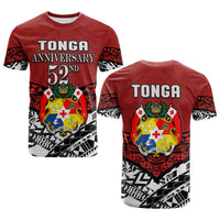 Red Tonga Anniversary 52nd graphic T-shirt, front view with crest and black patterned sleeves