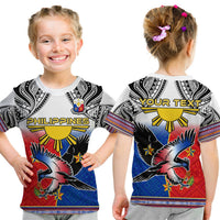 Kids white graphic T-shirt with eagle, Philippines text, and tribal pattern