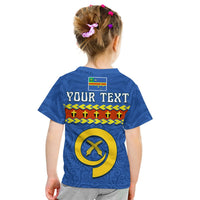 Blue kid t-shirt back with YOUR TEXT and circular emblem, zigzag band, and stars