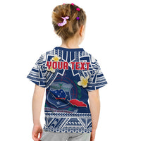 Kids Samoa T-shirt in blue with back YOUR TEXT print, plumeria flowers, and patterned hem