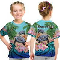 Blue tropical turtle T-shirt on kids, front and back show turtle, orchid, and "Yyour Text"
