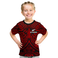 Kids rugby T-shirt in black and red with Maori pattern and All Blacks emblem, front