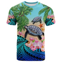 Blue tropical turtle T-shirt with palm trees, orchids, starfish, and shell artwork