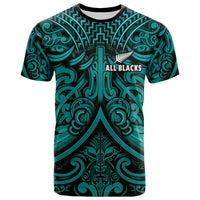 Turquoise and black rugby T-shirt with All Blacks crest and tribal pattern, front view
