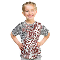Polynesian tattoo T-shirt with large central flower and zigzag border in red and black