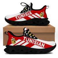 White upper black-soled clunky sneakers with Tunisia stripe graphic and black laces