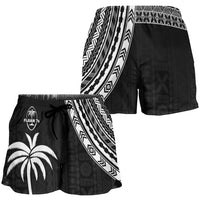 Women’s black rugby sevens shorts with white tapa-style border and patterned side panel