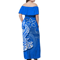 Blue off-shoulder maxi dress, back view, with large hammerhead shark print