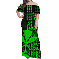Green and black tropical off-shoulder maxi dress with geometric and tiki-style print