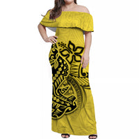 Yellow off-shoulder maxi dress with black hammerhead tribal pattern