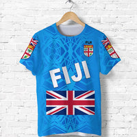Blue Fiji T-shirt with large Fiji lettering, Union Jack flag, and crest on chest