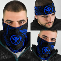 Blue tribal wave face bandana with black pattern, worn on head and covering mouth