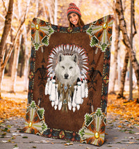 white-wolf-with-headress-feathers-blanket
