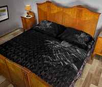 Black quilt bed set with raven feather print and rune pattern, diamond-quilted texture