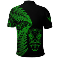 Black polo shirt with green Maori face emblem and fern artwork on back