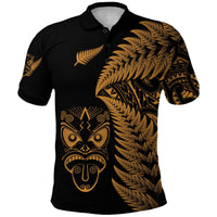 Black polo shirt with gold haka face mask and fern print on front