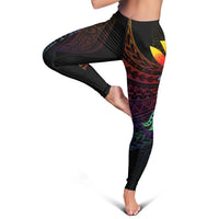 Black leggings with multicolor Polynesian tribal print and butterfly motif near hip