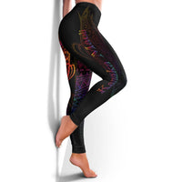 Black leggings with colorful Polynesian scroll and butterfly artwork, side view