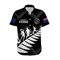 Black button-front Hawaiian shirt with Football Ferns text, player silhouettes, short sleeves