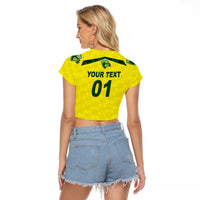 Yellow cropped raglan T-shirt, back text YOUR TEXT 01 with green neckline trim