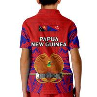 Red kid polo shirt with blue sleeves and Papua New Guinea text on back