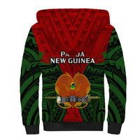 Red sherpa hoodie with green tribal pattern, crest bird graphic on back, hood.