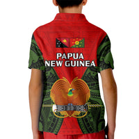 Kids polo shirt back, red and green with Papua New Guinea text and bird emblem