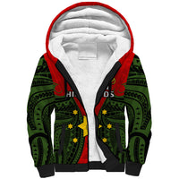 Sherpa hoodie with red hood, white lining, green tribal print and black trim
