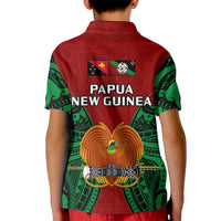 Kids polo shirt with red and green back print, Papua New Guinea text and bird emblem