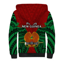 Unisex red sherpa hoodie back with green tribal design and central bird emblem, hood