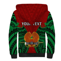 Red sherpa hoodie back with green tribal design, gold bird emblem and 'YOUR TEXT'