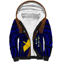 Sherpa lined hoodie with blue and brown tribal print, black trim, white hood lining