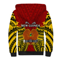 Red sherpa hoodie back with Papua New Guinea text and gold bird graphic, patterned sleeves