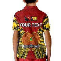 Kids red polo shirt back with 'YOUR TEXT' and eagle crest graphic on yellow patterns