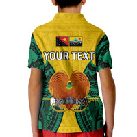 Kids yellow polo shirt with green patterned sleeves, back YOUR TEXT and bird emblem