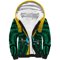 Yellow sherpa hoodie with green Polynesian print, black zip, and white fleece hood