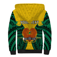 Yellow sherpa hoodie with green pattern, eagle emblem, and “YOUR TEXT” panel