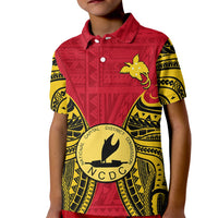 Kids red polo shirt with yellow and black Polynesian print and crest graphic