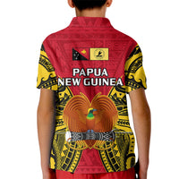 Kids red polo shirt back with 'PAPUA NEW GUINEA' text, bird and drum graphic