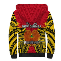 Back of red sherpa hoodie with Papua New Guinea text and bird crest, yellow tribal panels.