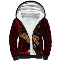 Black sherpa zip hoodie with red Tongan pattern, white lining, hand graphic, kangaroo pocket