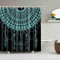 Dark shower curtain with teal dreamcatcher mandala and hanging bead and feather details