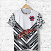 White rugby union T-shirt front with REWA crest, red crab, and black geometric V stripes