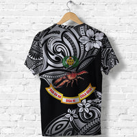 Black rugby t-shirt back: large spiral design, flower accents, circular crest patch
