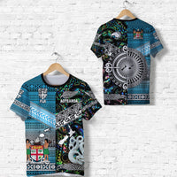 Teal/blue graphic T-shirt with Maori & Fiji tapa motifs, crew neck, short sleeves