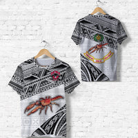 White rugby-style T-shirt with black geometric pattern and red crab graphic, on hanger